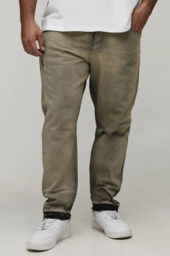 Jean grande taille, coupe slim, aux déchirures subtiles, teinté, avec ourlet abaissé