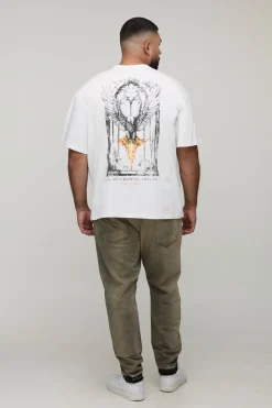 Jean grande taille, coupe slim, aux déchirures subtiles, teinté, avec ourlet abaissé