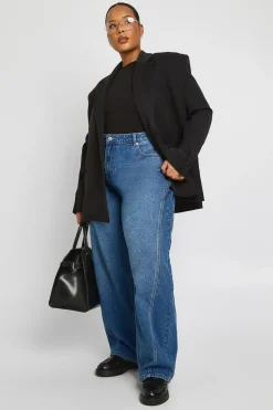 Jean grande taille à taille mi-haute, coutures torsadées et jambe en tonneau