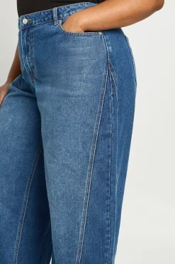 Jean grande taille à taille mi-haute, coutures torsadées et jambe en tonneau