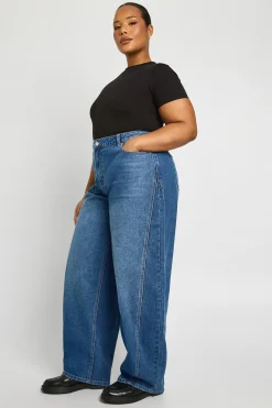 Jean grande taille à taille mi-haute, coutures torsadées et jambe en tonneau