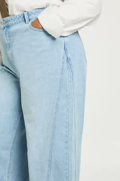 Jean Plus à taille mi-haute avec couture torsadée et jambe tonneau