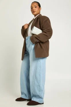 Jean Plus à taille mi-haute avec couture torsadée et jambe tonneau