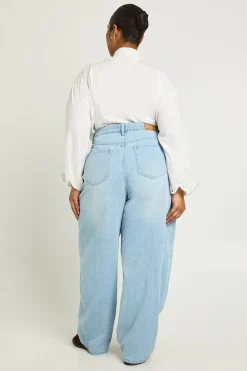 Jean Plus à taille mi-haute avec couture torsadée et jambe tonneau