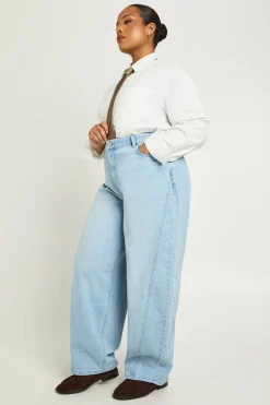 Jean Plus à taille mi-haute avec couture torsadée et jambe tonneau