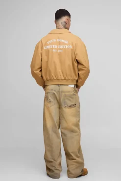 Jean pour grandes tailles, coupe ample, délavé, avec appliqué en forme d'étoile