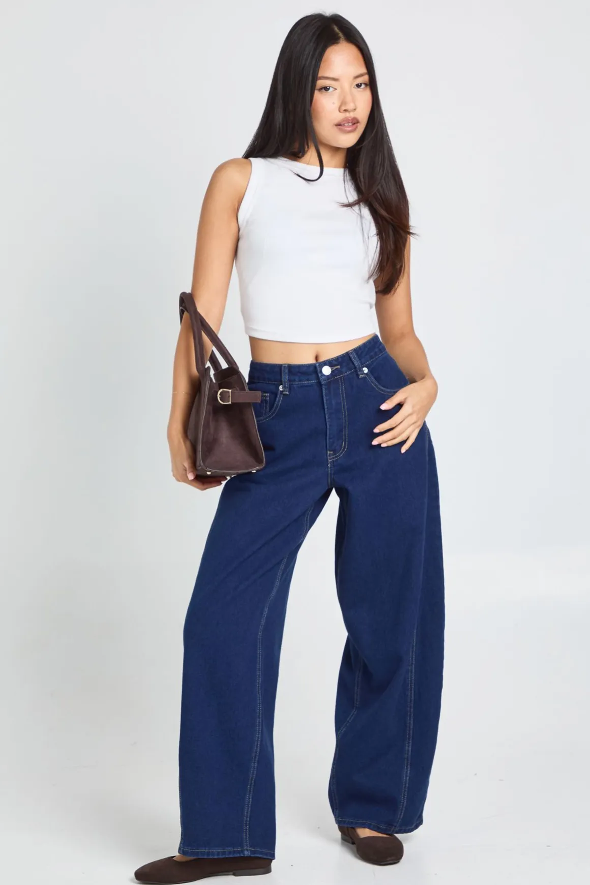 Jean pour petite taille à taille mi-haute, couture torsadée et jambe tonneau