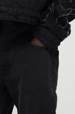 Jeans à appliqué flamme, coupe slim empilée et évasée