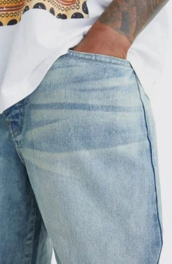 Jeans baggy rigides délavés
