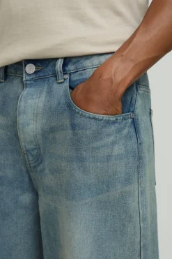 Jeans baggy rigides délavés