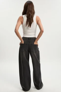 Jeans cloutés à taille mi et jambes larges