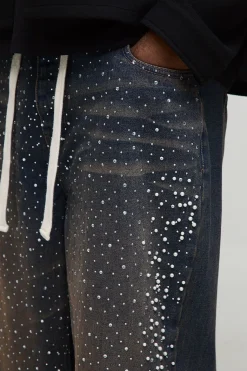 Jeans à coupe décontractée avec cordon de serrage allongé et strass plus teintés