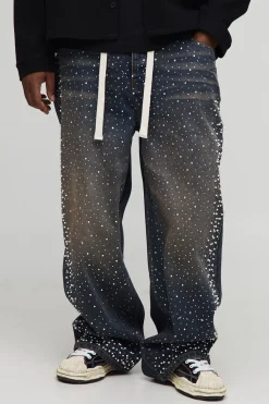 Jeans à coupe décontractée avec cordon de serrage allongé et strass plus teintés