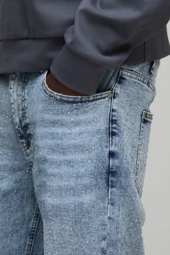 Jeans à coupe décontractée ornés de strass transparents sur toute la surface