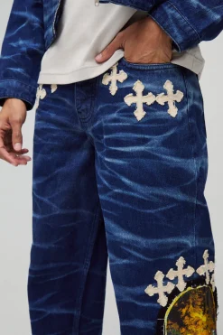 Jeans décontractés à appliqué croisé, effet froissé et délavé