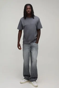 boohooMAN Jeans décontractés coupe relax avec poches ornées d'étoiles en strass sur toute la surface<Homme Denim|Denim