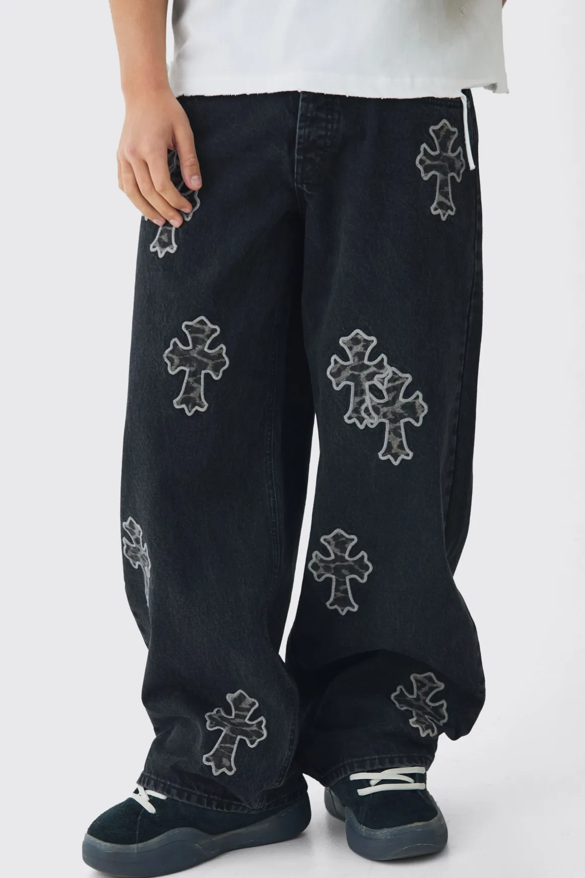 Jeans en denim baggy rigide à appliqué léopard croisé