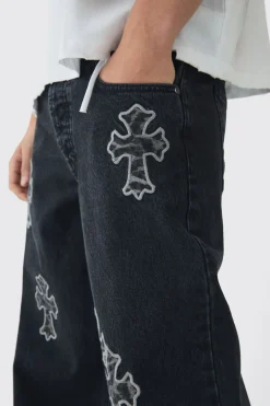 Jeans en denim baggy rigide à appliqué léopard croisé