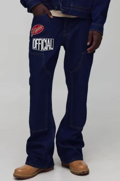 Jeans en denim Carpenter à coupe décontractée, jambe évasée et badge varsity