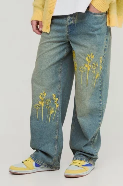 Jeans en denim lavé à broderies décontractées et rigides