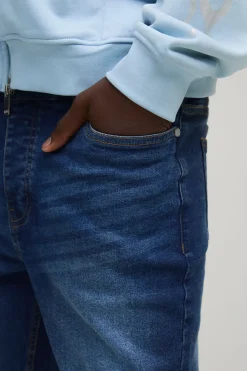 Jean Skinny Évasé Empilé Avec Déchirure Au Genou
