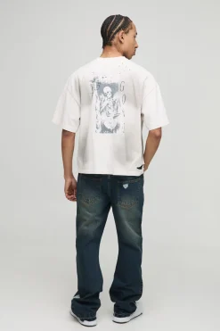 Jean slim évasé vintage bleu délavé distressed à empiècement