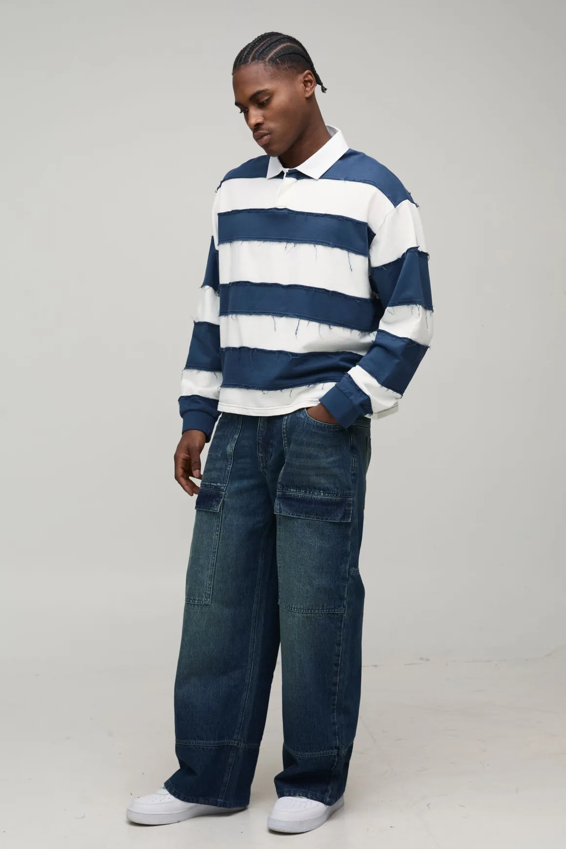 Jeans moto gaufrés à panneaux avec jambes larges