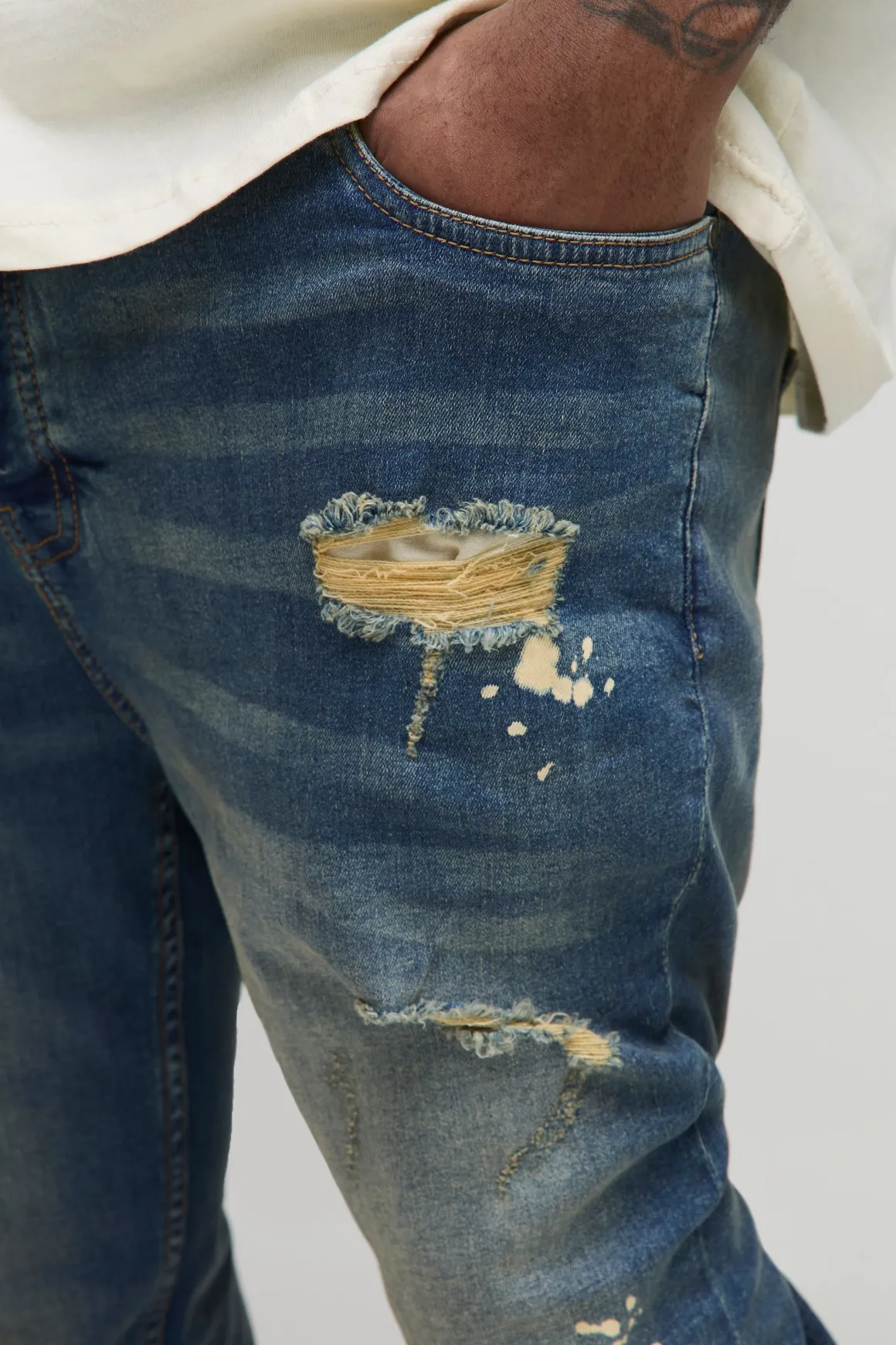 Jeans Skinny déchiré sur toute la longueur, délavé et éclaboussé de peinture