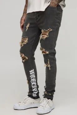 Jeans skinny pour grande taille, à ourlets empilés, usés et agrémentés d’un empiècement brodé