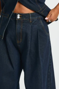 Jean taille haute à doubles plis et jambes larges