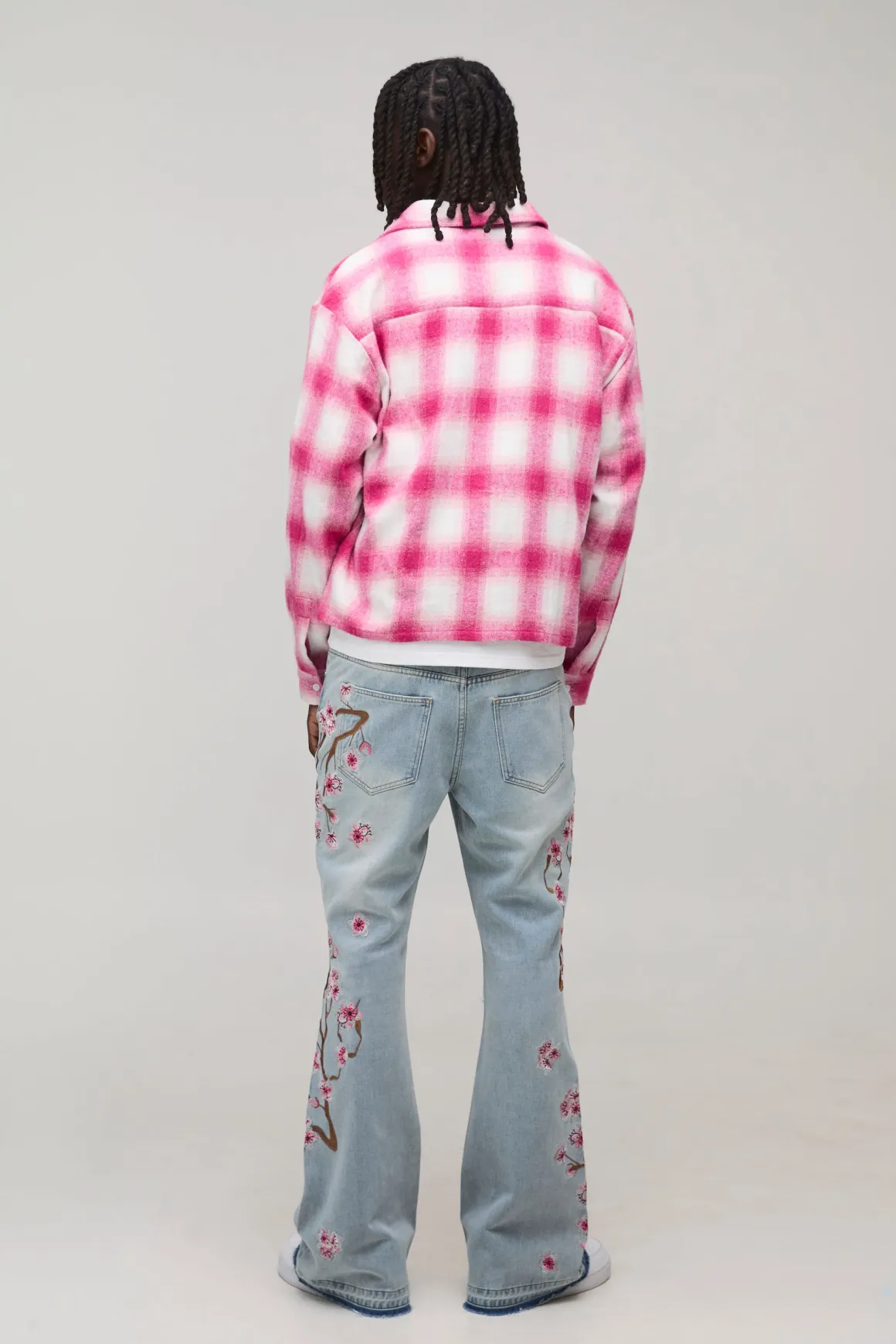 Jean Évasé Brodé Floral Effet Usé À Ourlet Défait