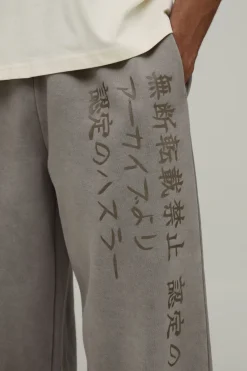 Jogger Délavé Graphique À Jambes Larges