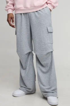 Jogger à jambes larges, poches cargo, système de réglage et taille brute