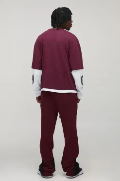 Jogger pour grandes tailles, à coupe décontractée, à jambe évasée, lavé au spray, avec empiècement crâne
