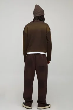 Joggers à coupe ample ornés de strass et traités au lavage par pulvérisation