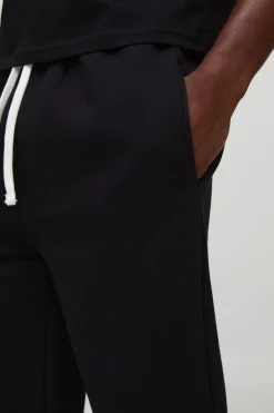 Joggers à coupe décontractée, évasés, à ourlet fendu