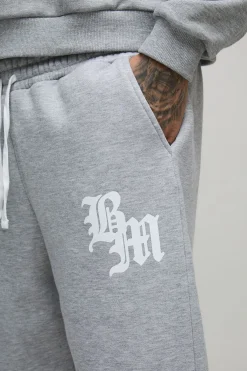 boohooMAN Joggers hauts et amples, gothiques BM à imprimé croisé<Homme Tout Afficher|Jogging