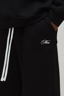 Joggers homme Baggy Script à entrejambe tombante