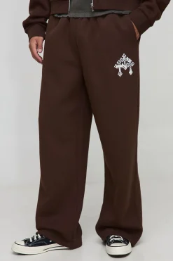 boohooMAN Joggers à jambes larges, imprimé vache et appliqué croisé<Homme Joggings|Jogging