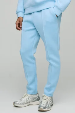 Joggers Slim Taperés en Scuba Bondé