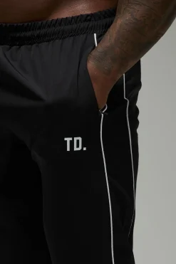 Joggers Tissés À Jambe Droite Training Dept