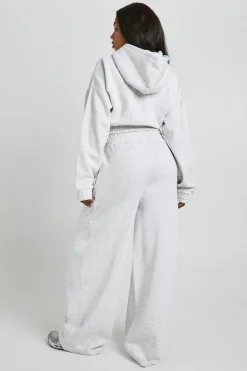 Jogger à taille haute avec détails plissés et jambe droite