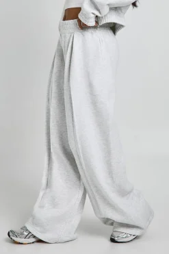 Jogger à taille haute avec détails plissés et jambe droite