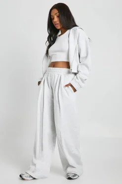 Jogger à taille haute avec détails plissés et jambe droite