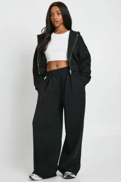 Jogger taille haute à détails plissés et jambe droite