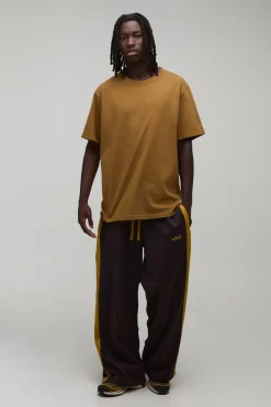 boohooMAN Jogger Tricot Brodé À Jambe Large<Homme Jogging|Tout Afficher