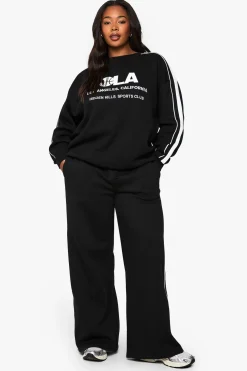 Joggeurs à jambes larges Plus Side Stripe