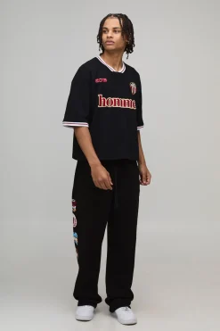 boohooMAN Jogging Coupe Baggy avec Badge Universitaire Imprimé<Homme Jogging|Tout Afficher