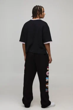 boohooMAN Jogging Coupe Baggy avec Badge Universitaire Imprimé<Homme Jogging|Tout Afficher