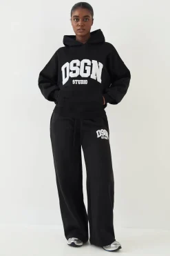 Jogging DSGN Studio en Tissu Éponge avec Appliqué Coupe Droite